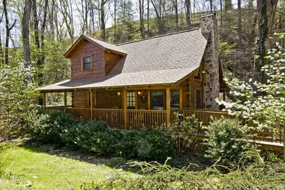 natures grace retreat cabin during sunny spring day