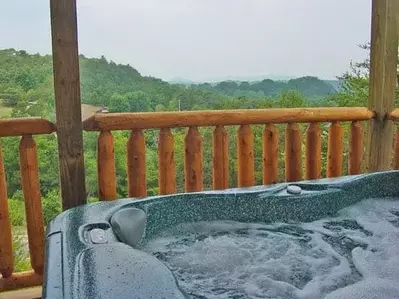 Hot tub on the deck of the Hillside Retreat cabin in the Smoky Mountains.