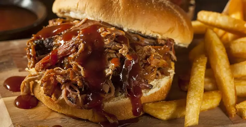pulled pork sandwich with fries