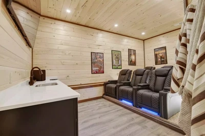 bear olympics is one of our cabins with theater rooms in pigeon forge