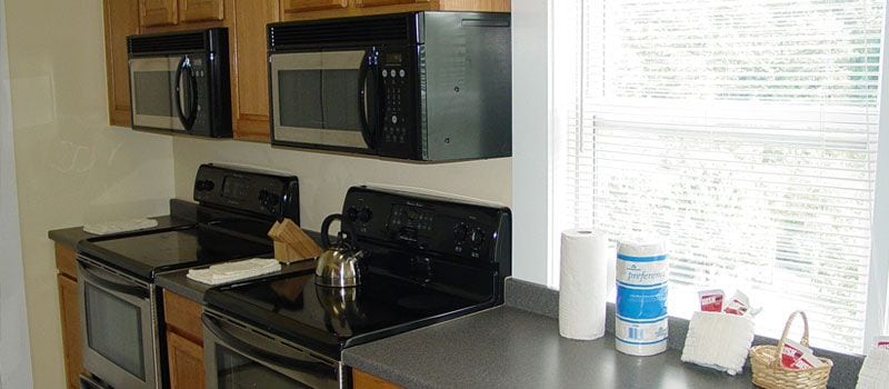 The fully furnished kitchen of a Pigeon Forge cabin in Eagles Ridge Resort.