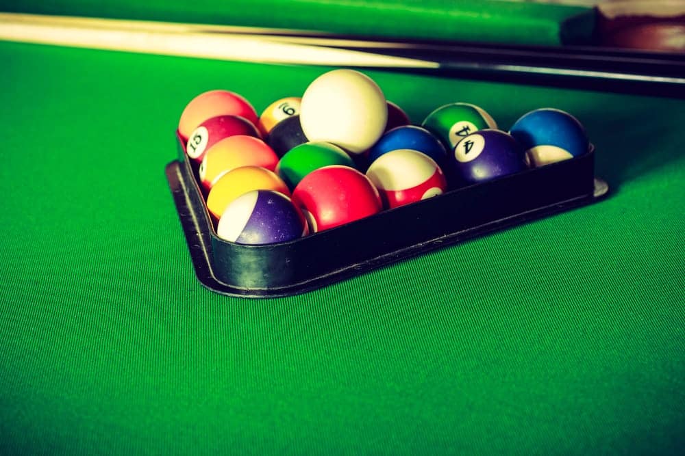 Pool table with pool cue