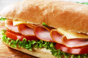 ham sandwich on table