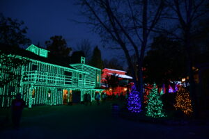 Christmas lights on buildings and trees at Dollywood's Smoky Mountain Christmas