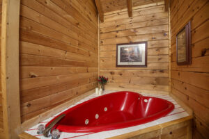 Heart-shaped spa tub at Blue Heaven cabin